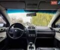 Черный Фольксваген Поло, объемом двигателя 1.4 л и пробегом 170 тыс. км за 5900 $, фото 11 на Automoto.ua