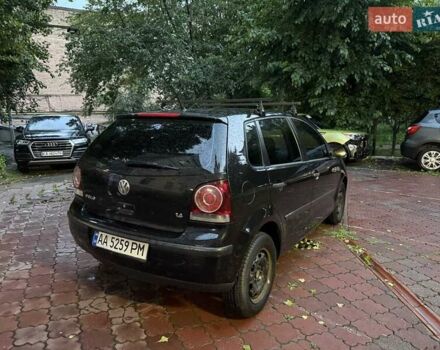 Черный Фольксваген Поло, объемом двигателя 1.39 л и пробегом 131 тыс. км за 4400 $, фото 3 на Automoto.ua