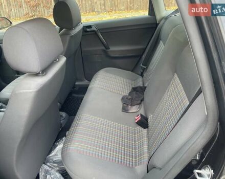 Черный Фольксваген Поло, объемом двигателя 1.4 л и пробегом 114 тыс. км за 6499 $, фото 14 на Automoto.ua