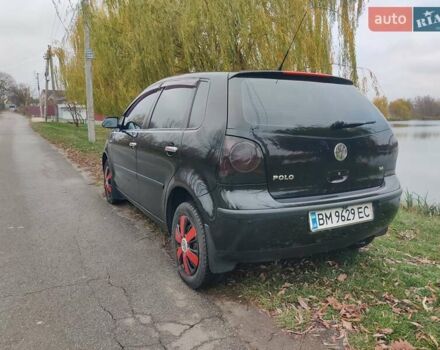 Черный Фольксваген Поло, объемом двигателя 1.4 л и пробегом 170 тыс. км за 5900 $, фото 4 на Automoto.ua