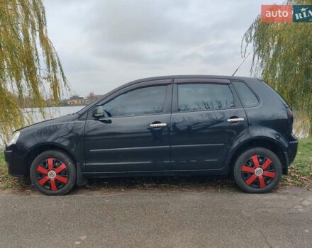 Черный Фольксваген Поло, объемом двигателя 1.4 л и пробегом 170 тыс. км за 5900 $, фото 2 на Automoto.ua