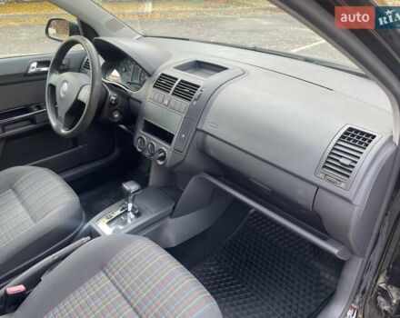 Черный Фольксваген Поло, объемом двигателя 1.4 л и пробегом 114 тыс. км за 6499 $, фото 22 на Automoto.ua