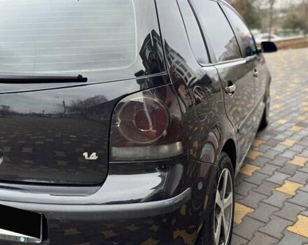 Черный Фольксваген Поло, объемом двигателя 1.4 л и пробегом 212 тыс. км за 4500 $, фото 8 на Automoto.ua