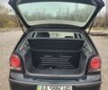 Черный Фольксваген Поло, объемом двигателя 1.4 л и пробегом 220 тыс. км за 3700 $, фото 5 на Automoto.ua