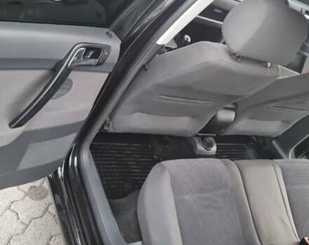 Черный Фольксваген Поло, объемом двигателя 1.6 л и пробегом 182 тыс. км за 5750 $, фото 2 на Automoto.ua