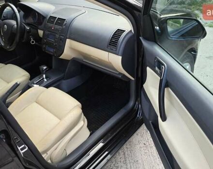 Черный Фольксваген Поло, объемом двигателя 1.6 л и пробегом 212 тыс. км за 7399 $, фото 50 на Automoto.ua