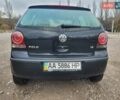 Черный Фольксваген Поло, объемом двигателя 1.4 л и пробегом 220 тыс. км за 3700 $, фото 4 на Automoto.ua