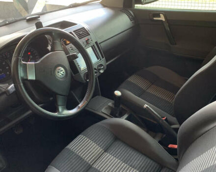 Черный Фольксваген Поло, объемом двигателя 1.2 л и пробегом 270 тыс. км за 4200 $, фото 6 на Automoto.ua