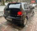 Черный Фольксваген Поло, объемом двигателя 1.4 л и пробегом 312 тыс. км за 4300 $, фото 1 на Automoto.ua