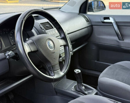 Чорний Фольксваген Поло, об'ємом двигуна 1.4 л та пробігом 189 тис. км за 5350 $, фото 26 на Automoto.ua