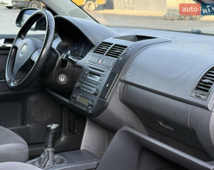 Черный Фольксваген Поло, объемом двигателя 1.4 л и пробегом 188 тыс. км за 4999 $, фото 37 на Automoto.ua