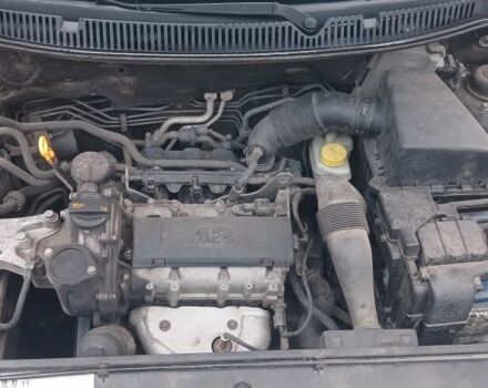 Черный Фольксваген Поло, объемом двигателя 1.2 л и пробегом 225 тыс. км за 4000 $, фото 6 на Automoto.ua