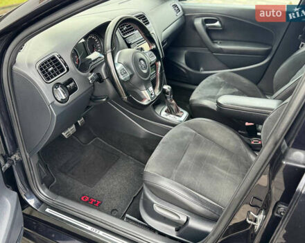 Черный Фольксваген Поло, объемом двигателя 1.4 л и пробегом 217 тыс. км за 9650 $, фото 41 на Automoto.ua