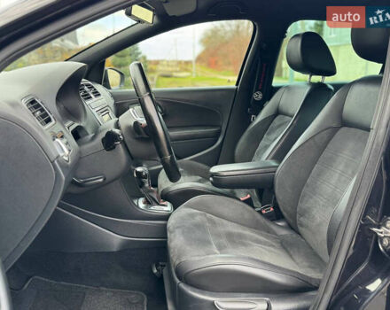 Черный Фольксваген Поло, объемом двигателя 1.4 л и пробегом 217 тыс. км за 9650 $, фото 36 на Automoto.ua