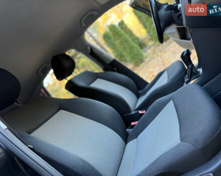 Черный Фольксваген Поло, объемом двигателя 1.39 л и пробегом 143 тыс. км за 7850 $, фото 50 на Automoto.ua