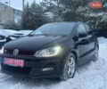 Черный Фольксваген Поло, объемом двигателя 1.4 л и пробегом 220 тыс. км за 9790 $, фото 1 на Automoto.ua