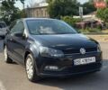 Черный Фольксваген Поло, объемом двигателя 1 л и пробегом 275 тыс. км за 6900 $, фото 1 на Automoto.ua