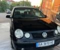 Черный Фольксваген Поло, объемом двигателя 1.2 л и пробегом 200 тыс. км за 1500 $, фото 4 на Automoto.ua