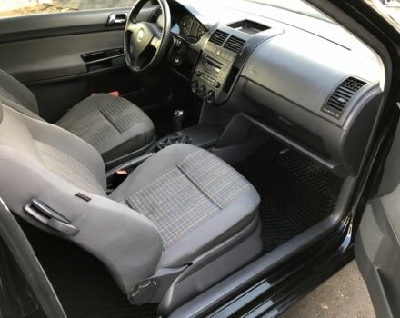 Черный Фольксваген Поло, объемом двигателя 1.4 л и пробегом 260 тыс. км за 3850 $, фото 13 на Automoto.ua