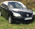 Черный Фольксваген Поло, объемом двигателя 1.4 л и пробегом 260 тыс. км за 3850 $, фото 19 на Automoto.ua