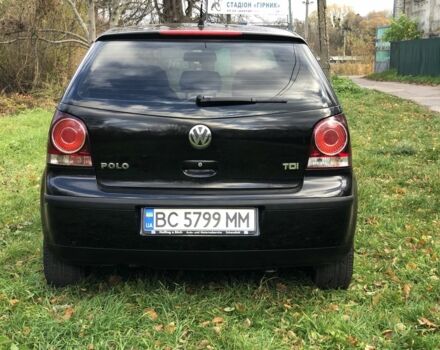 Черный Фольксваген Поло, объемом двигателя 1.4 л и пробегом 260 тыс. км за 3850 $, фото 4 на Automoto.ua