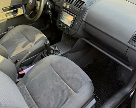 Черный Фольксваген Поло, объемом двигателя 1.4 л и пробегом 227 тыс. км за 2550 $, фото 7 на Automoto.ua