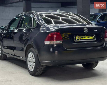 Черный Фольксваген Поло, объемом двигателя 1.6 л и пробегом 226 тыс. км за 7500 $, фото 3 на Automoto.ua