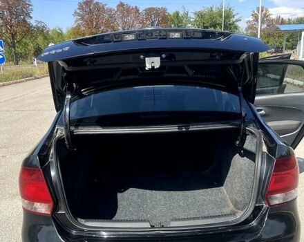 Черный Фольксваген Поло, объемом двигателя 1.6 л и пробегом 200 тыс. км за 7500 $, фото 1 на Automoto.ua