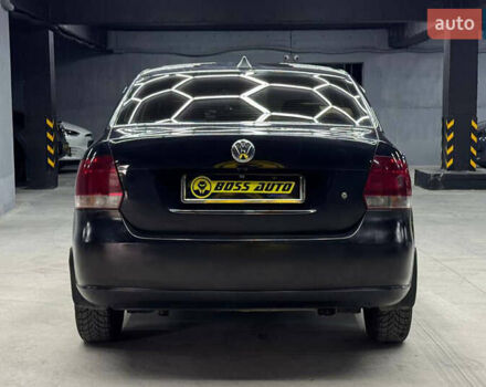 Черный Фольксваген Поло, объемом двигателя 1.6 л и пробегом 226 тыс. км за 7500 $, фото 4 на Automoto.ua