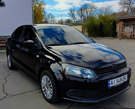 Черный Фольксваген Поло, объемом двигателя 1.6 л и пробегом 196 тыс. км за 6400 $, фото 3 на Automoto.ua