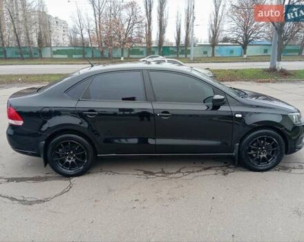 Черный Фольксваген Поло, объемом двигателя 1.6 л и пробегом 253 тыс. км за 6000 $, фото 1 на Automoto.ua