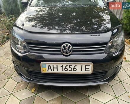 Черный Фольксваген Поло, объемом двигателя 1.6 л и пробегом 70 тыс. км за 8300 $, фото 1 на Automoto.ua
