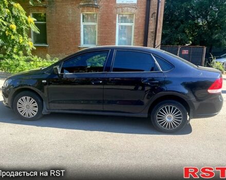 Черный Фольксваген Поло, объемом двигателя 1.6 л и пробегом 218 тыс. км за 7555 $, фото 1 на Automoto.ua