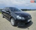 Черный Фольксваген Поло, объемом двигателя 1.6 л и пробегом 212 тыс. км за 6350 $, фото 1 на Automoto.ua