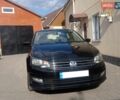 Черный Фольксваген Поло, объемом двигателя 1.4 л и пробегом 90 тыс. км за 10900 $, фото 1 на Automoto.ua