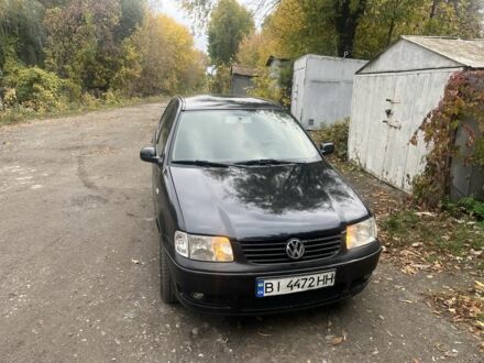 Черный Фольксваген Поло, объемом двигателя 1.4 л и пробегом 216 тыс. км за 2600 $, фото 1 на Automoto.ua