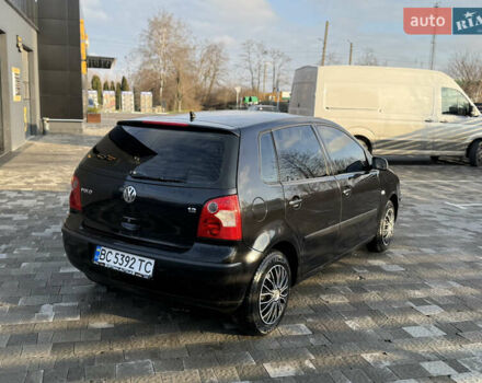 Черный Фольксваген Поло, объемом двигателя 1.4 л и пробегом 227 тыс. км за 2550 $, фото 1 на Automoto.ua