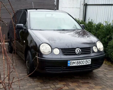 Черный Фольксваген Поло, объемом двигателя 1.4 л и пробегом 245 тыс. км за 4100 $, фото 1 на Automoto.ua