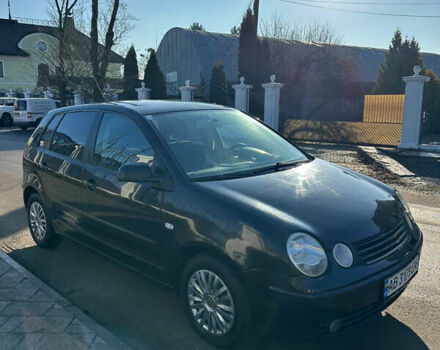 Черный Фольксваген Поло, объемом двигателя 1.2 л и пробегом 242 тыс. км за 2950 $, фото 1 на Automoto.ua