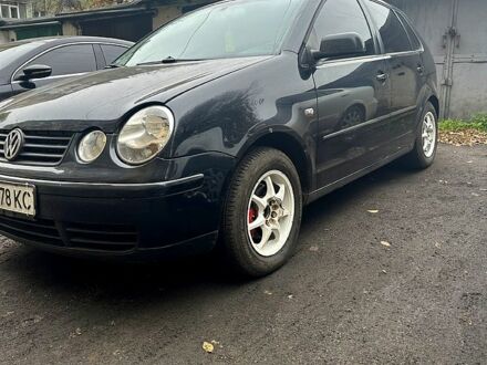 Чорний Фольксваген Поло, об'ємом двигуна 1.2 л та пробігом 230 тис. км за 2800 $, фото 1 на Automoto.ua