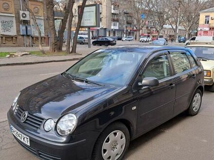 Черный Фольксваген Поло, объемом двигателя 1.2 л и пробегом 187 тыс. км за 5100 $, фото 1 на Automoto.ua