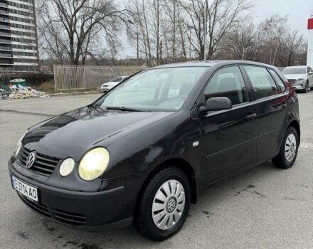 Черный Фольксваген Поло, объемом двигателя 1.4 л и пробегом 221 тыс. км за 3650 $, фото 1 на Automoto.ua