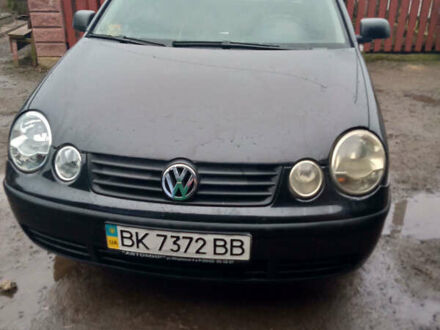 Черный Фольксваген Поло, объемом двигателя 1.4 л и пробегом 138 тыс. км за 3500 $, фото 1 на Automoto.ua