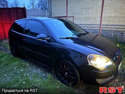 Черный Фольксваген Поло, объемом двигателя 1.4 л и пробегом 225 тыс. км за 4650 $, фото 1 на Automoto.ua