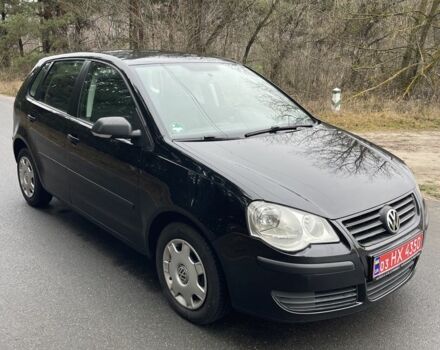 Черный Фольксваген Поло, объемом двигателя 1.4 л и пробегом 200 тыс. км за 4700 $, фото 1 на Automoto.ua