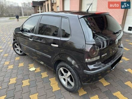 Черный Фольксваген Поло, объемом двигателя 1.4 л и пробегом 212 тыс. км за 4500 $, фото 1 на Automoto.ua