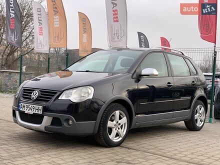 Черный Фольксваген Поло, объемом двигателя 1.4 л и пробегом 153 тыс. км за 6255 $, фото 1 на Automoto.ua