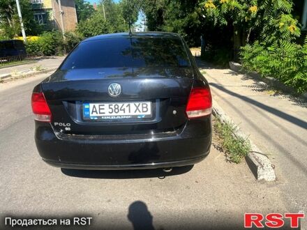 Черный Фольксваген Поло, объемом двигателя 1.6 л и пробегом 218 тыс. км за 7555 $, фото 1 на Automoto.ua