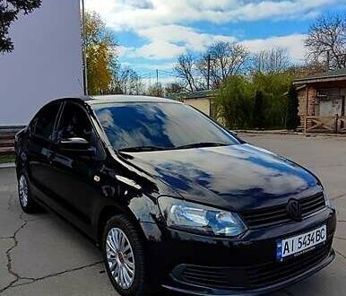 Черный Фольксваген Поло, объемом двигателя 1.6 л и пробегом 196 тыс. км за 6400 $, фото 1 на Automoto.ua