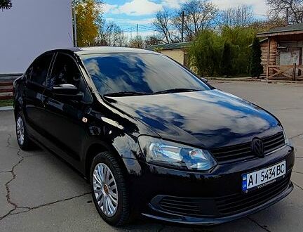 Черный Фольксваген Поло, объемом двигателя 1.6 л и пробегом 196 тыс. км за 6400 $, фото 1 на Automoto.ua